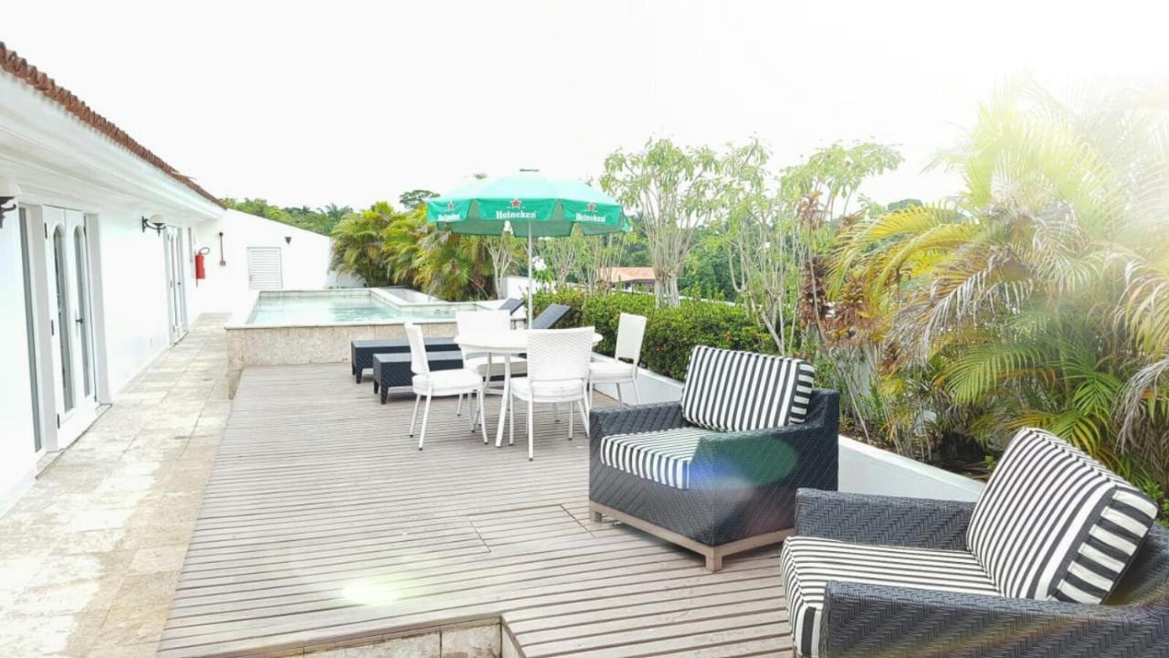 Hotel Tropical มาเนาส์ ภายนอก รูปภาพ Rooftop pool at the hotel