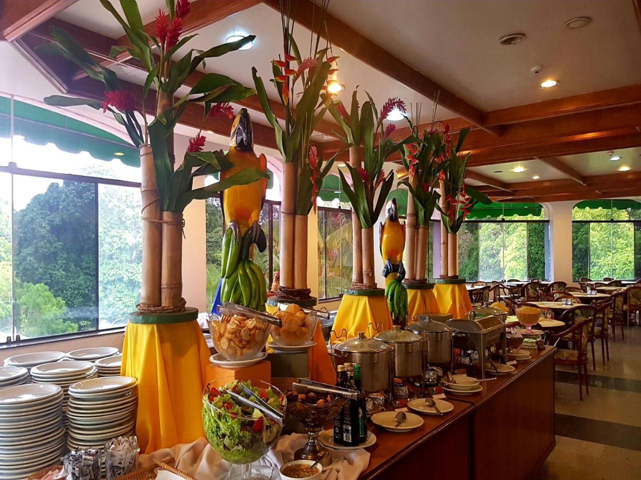 Hotel Tropical มาเนาส์ ภายนอก รูปภาพ The interior of the restaurant